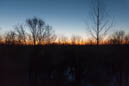 Looking southeast towards the Hugo water tower. The spectacular dawn skies are arriving just as I'm having a coffee and gathering myself to think about work.