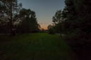 Sunset skies are ever beautiful. This shot looking down the left half of the front garden, neighbouring house just visible. Neighbours are British ex-pats, too.