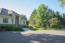 Front of the house and turning circle on a highly typical cloudless summer's day.